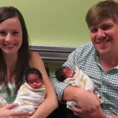 She gave birth to triplets... but they don't look anything like their father