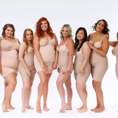Competition winners pose during a photo shoot for FIGUR shapewear at SunStudios in Australia