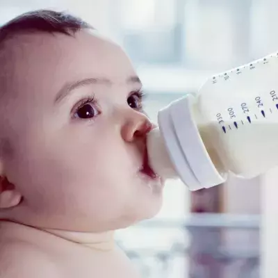 Baby drinking formula
