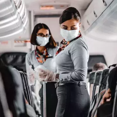A COVID-positive man disguised as his wife was caught mid flight