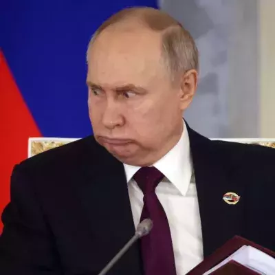 Vladimir Putin spotlight photos strange expressions