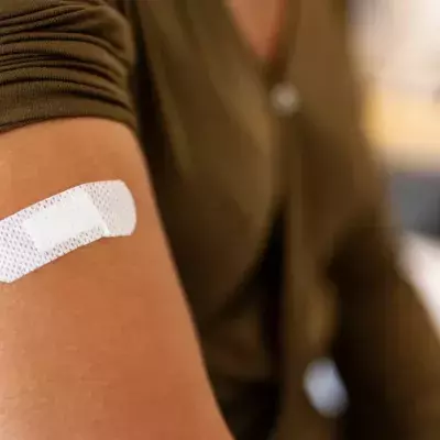 Booked your COVID booster shot? Here's the most common side effects and how to ease them