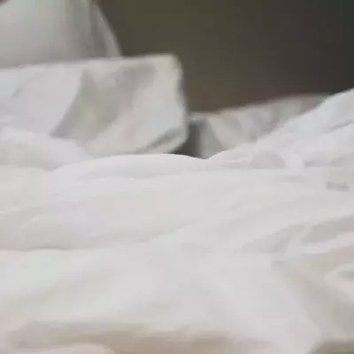 One third of Brits are said to wash their bed sheets only once a year, study reveals 