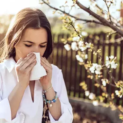 Sneezing woman