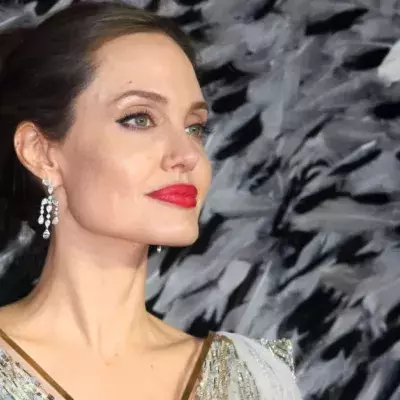 Angelina Jolie ‘Outraged’ At Brad Pitt And Jennifer Aniston Getting Close