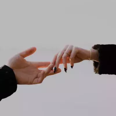 Couple holding hands