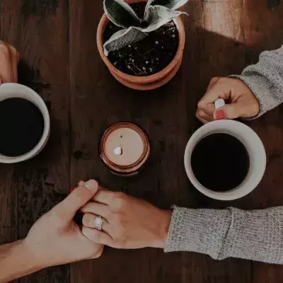 Couple holding hands