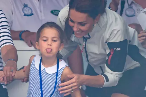 Princess Charlotte sticks her tongue out