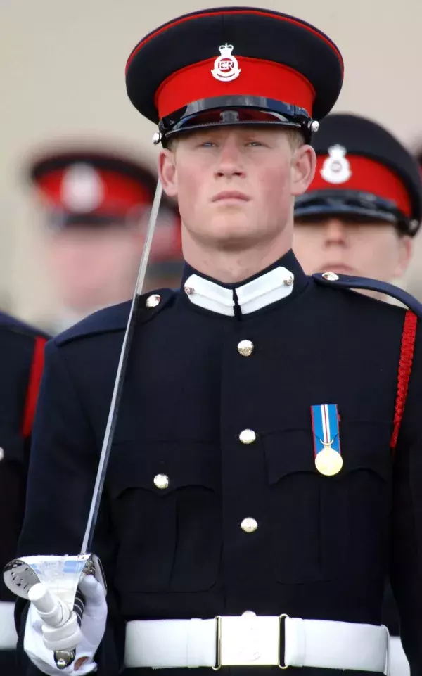 Queen Elizabeth II makes Prince Harry laugh