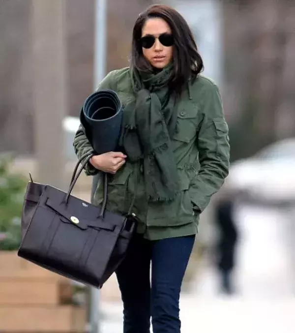 8. Meghan was spotted heading to yoga class in Toronto. Her famous green coat is from J.Crew and you can buy it for about £130.