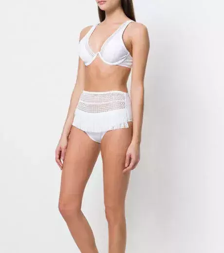 Crochet swimsuit: Try this unique white crochet swimsuit by Moeva.