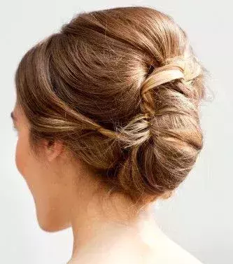 An elegant side bun for bridesmaids!