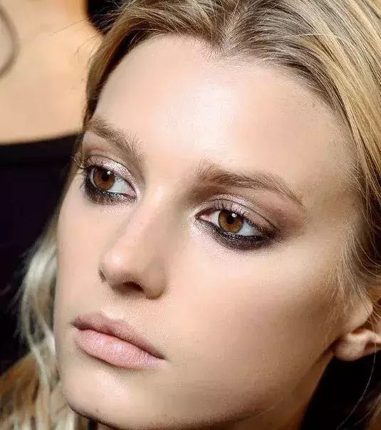 The glossy eyeshadow - it gives the illusion that you are wearing minimal makeup on your eyelids. Try this for a cute and natural glow! Also, you can try adding extra eyeshadow to your bottom lids for a bold look.