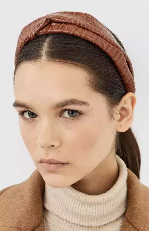 An imitation leather headband