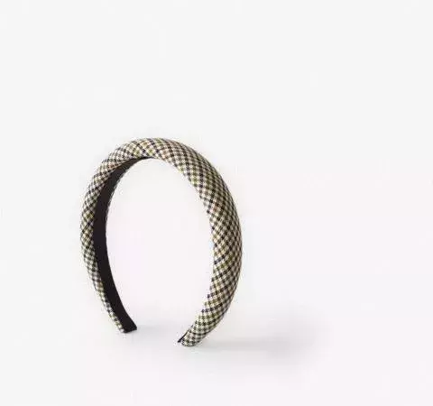 A large checkered headband by Zara
