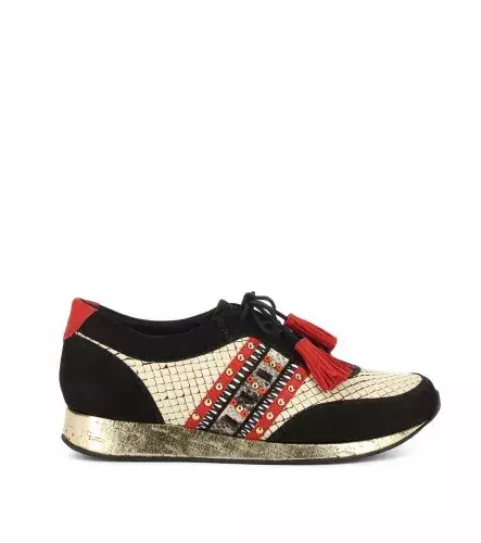 A little bit of every pattern. This trainer combines metallic, ethnic details, and snake print.
