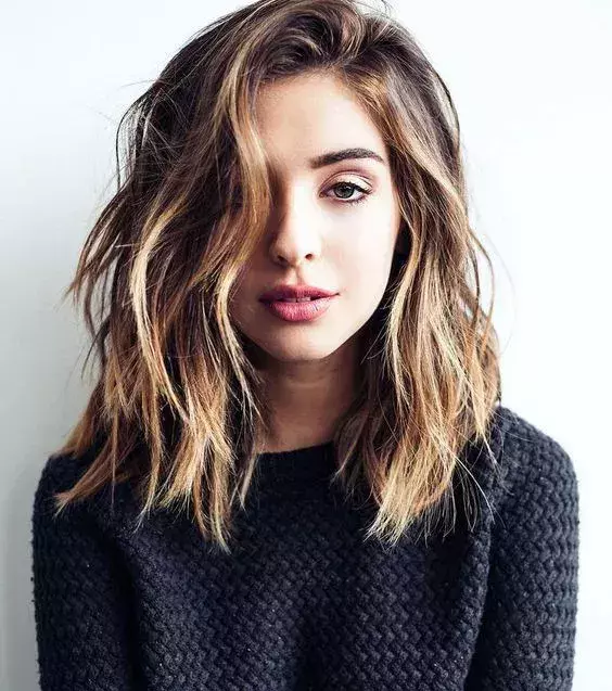 For a more relaxed beach wave look, try this style. It's effortless and natural.