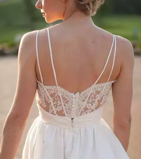 Thin straps and low bodice