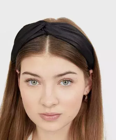 A twisted black headband     