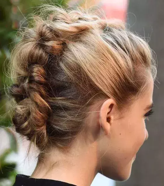 Unique side bun that is made to seek attention. Try this for your next girls' night out!