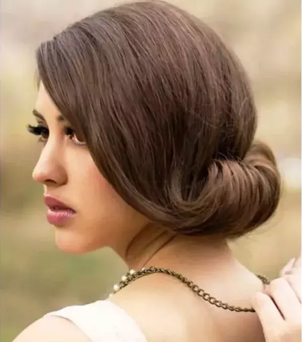 Wedding hairstyle - rolled bun