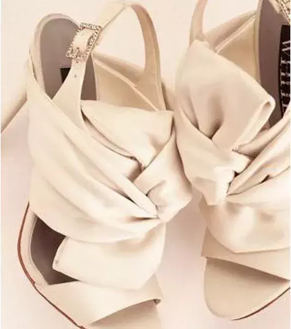 Wedding shoes: White by Vera Wang, £88