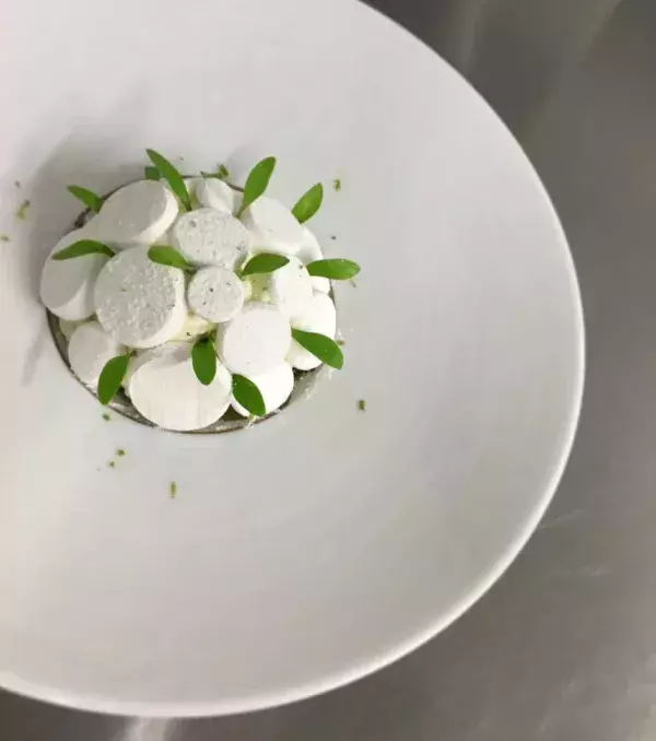 This is a pavlova with pineapple and coriander. Interesting combination right?