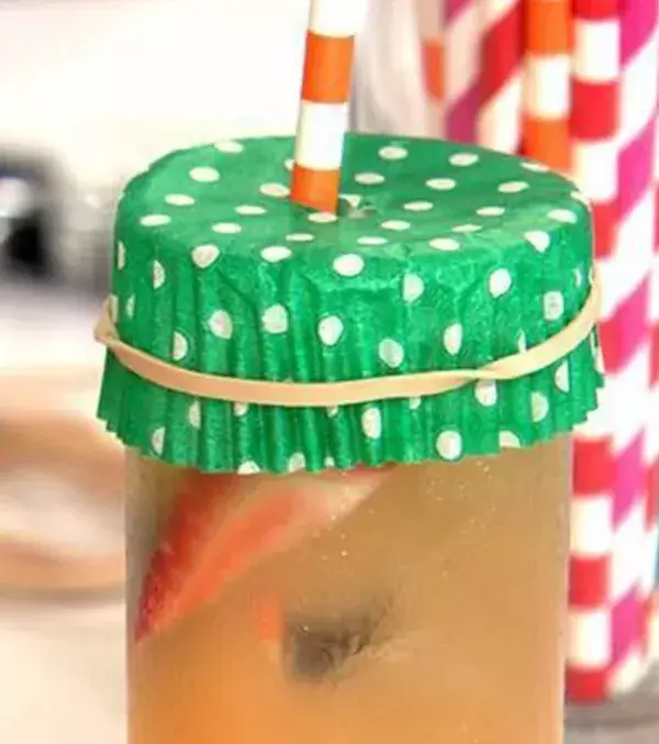 14: Use a cupcake case to cover the top of your glass. It will keep all the insects away! It's the perfect solution if you want to enjoy your drinks outside.