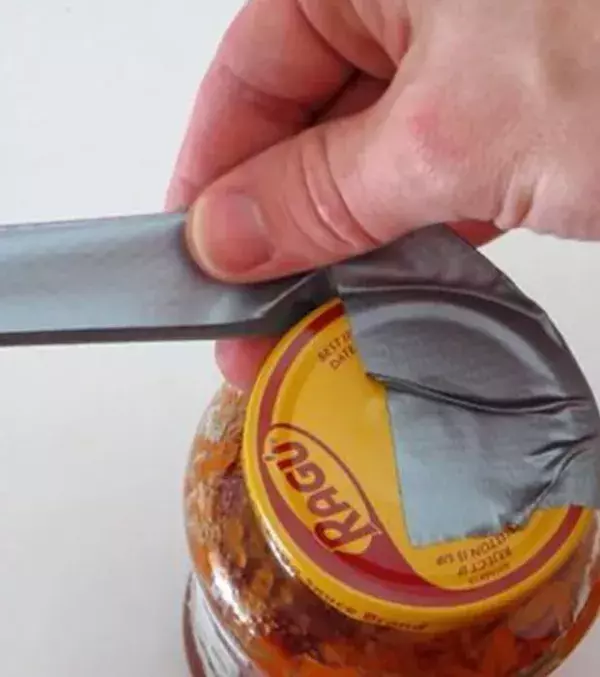 7: Use duct tape to help open stubborn lids. Make sure you wrap it tightly then pull away!