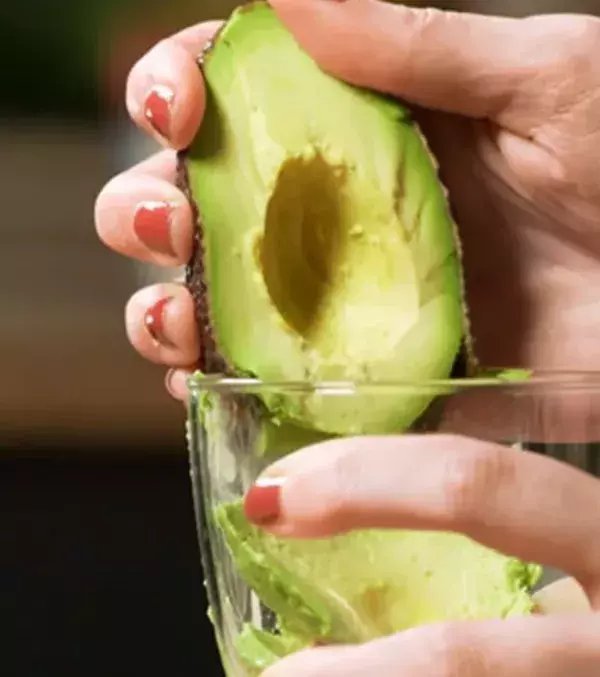 9: Use the side of a cup to help remove the avocado from the skin. You can use this method with mangos or kiwi and it works very well!