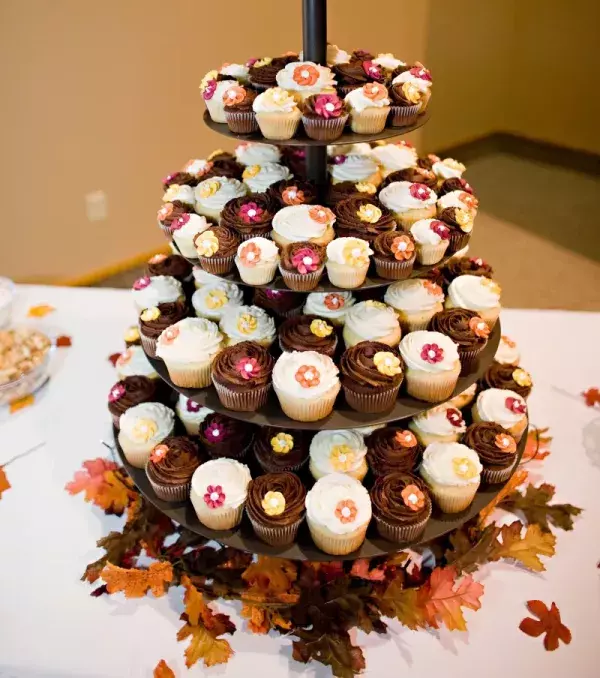 Cupcake wedding cakes are much more affordable and fun