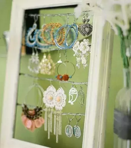 This photo frame makes a great jewelry holder.