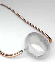 Remarkable necklace pendant with a rose gold touch