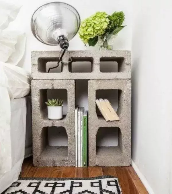 Use the breeze blocks as a rustic looking nightstand. It can hold all your favourite things and it won't cost you a fortune.