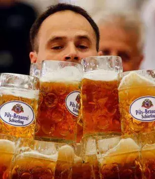 You drink too much beer - Beer has the tendency to make you sweat and heightens CO2 emissions, which mosquitoes love.